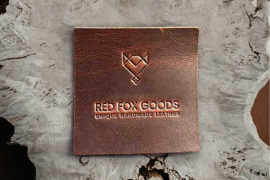 Red Fox Goods logo presentation on leather